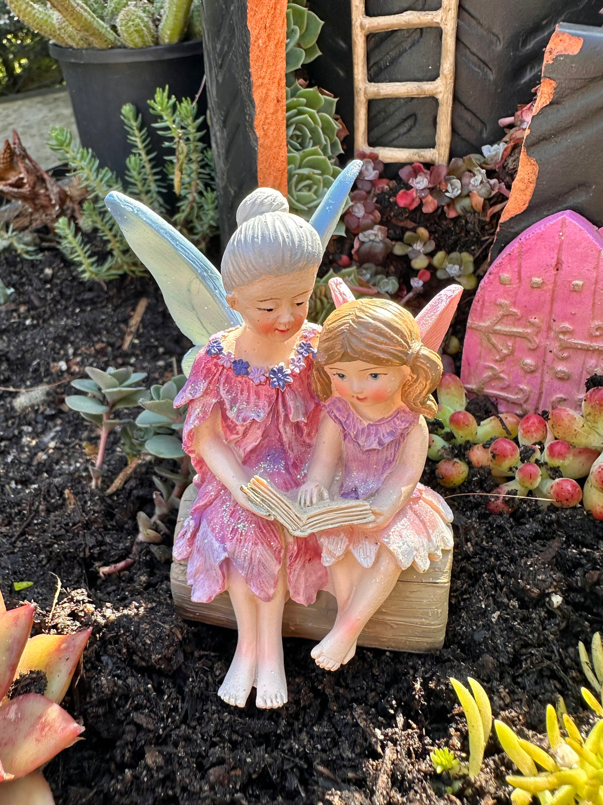 Fairy Grandmother reading with Fairy Granddaughter