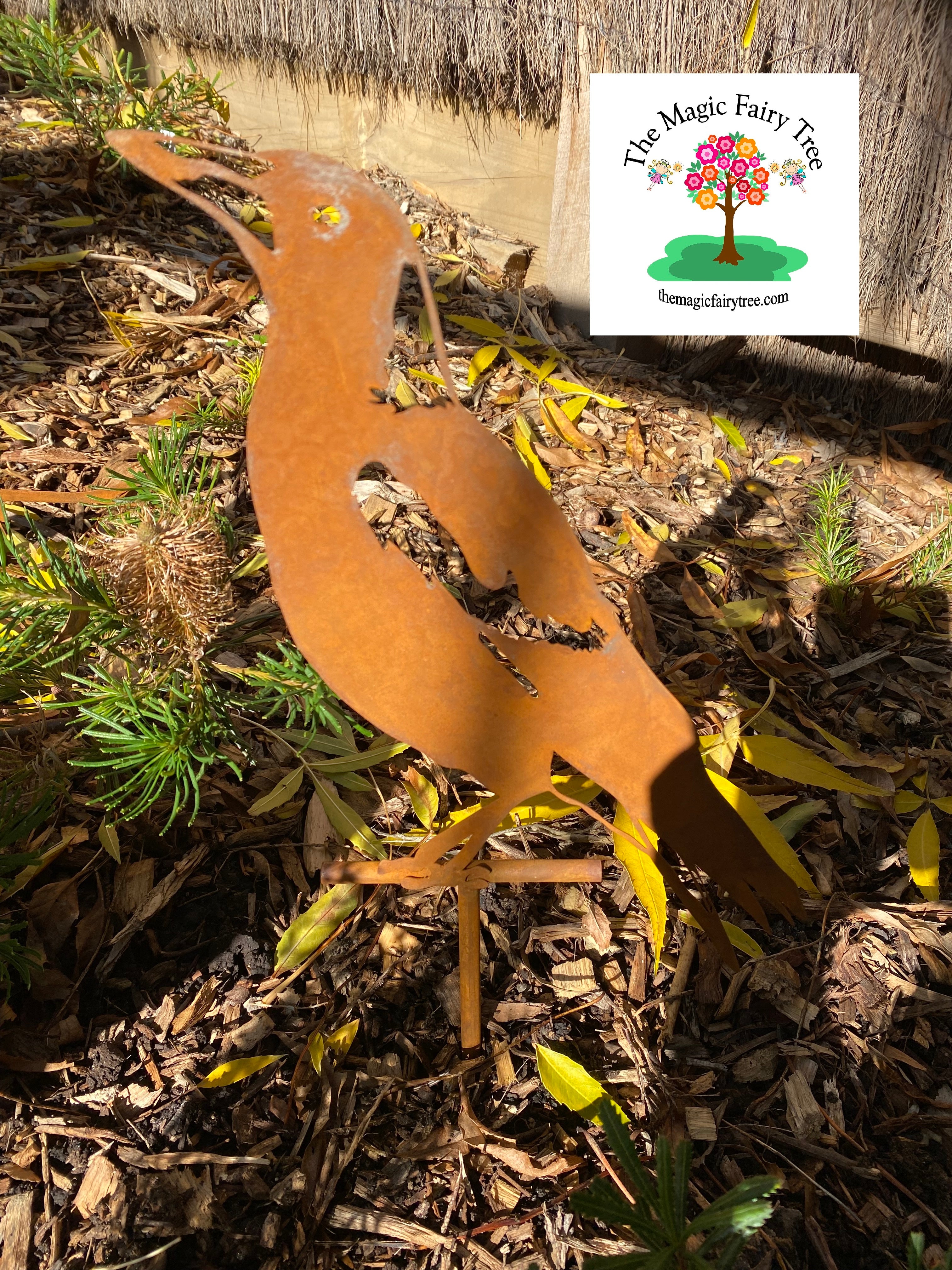 Pair of rusty metal magpie ground stakes image 1