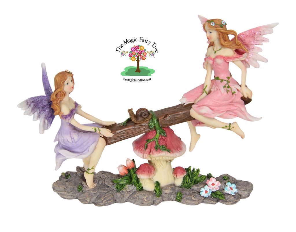 18cm fairies on seesaw image 0