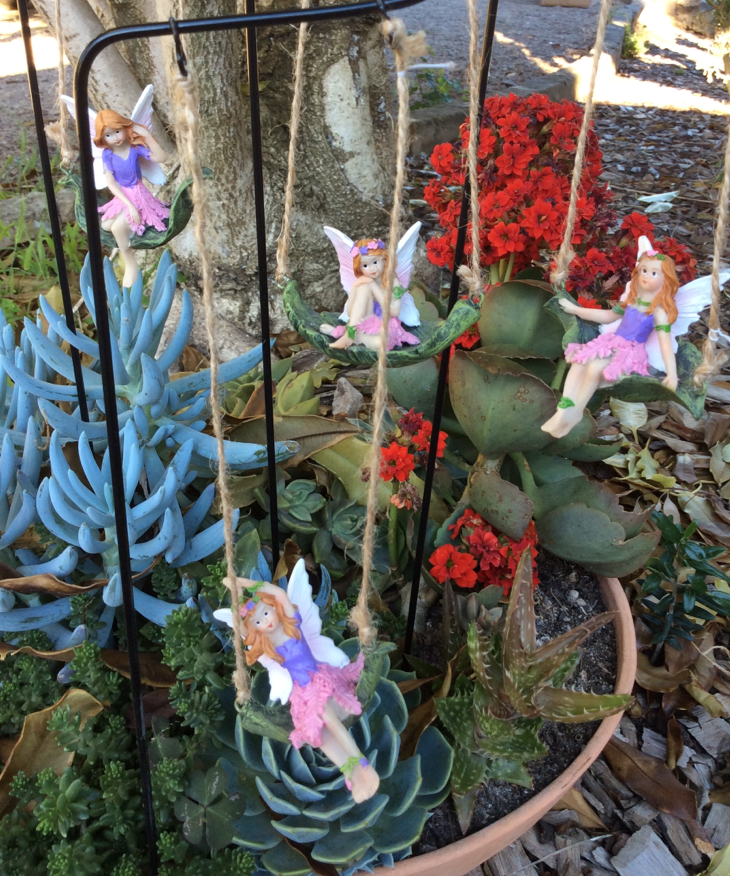 Set of 4 fairies sitting on a leaf swing with metal stake image 1