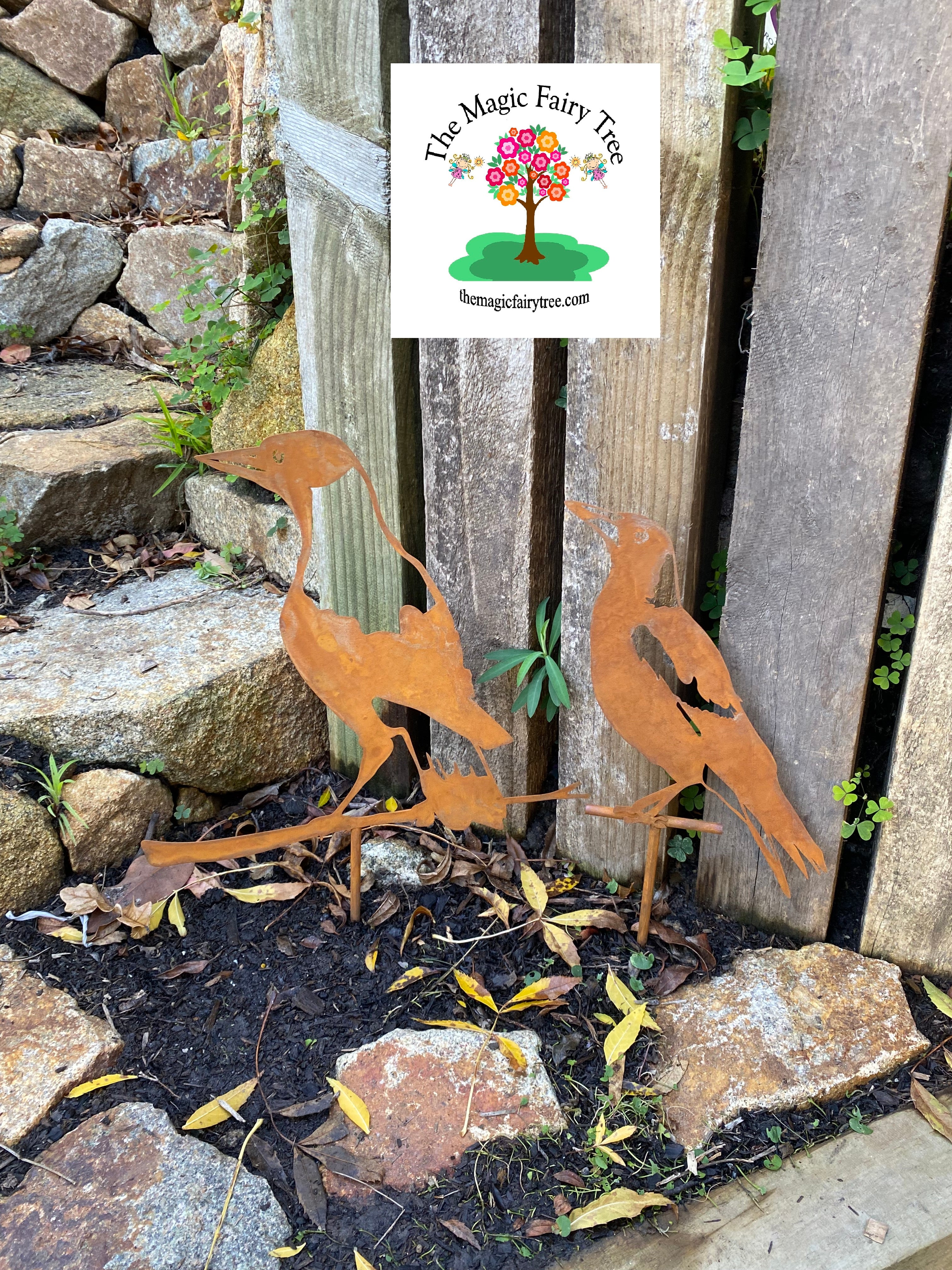 Pair of rusty metal magpie ground stakes image 0