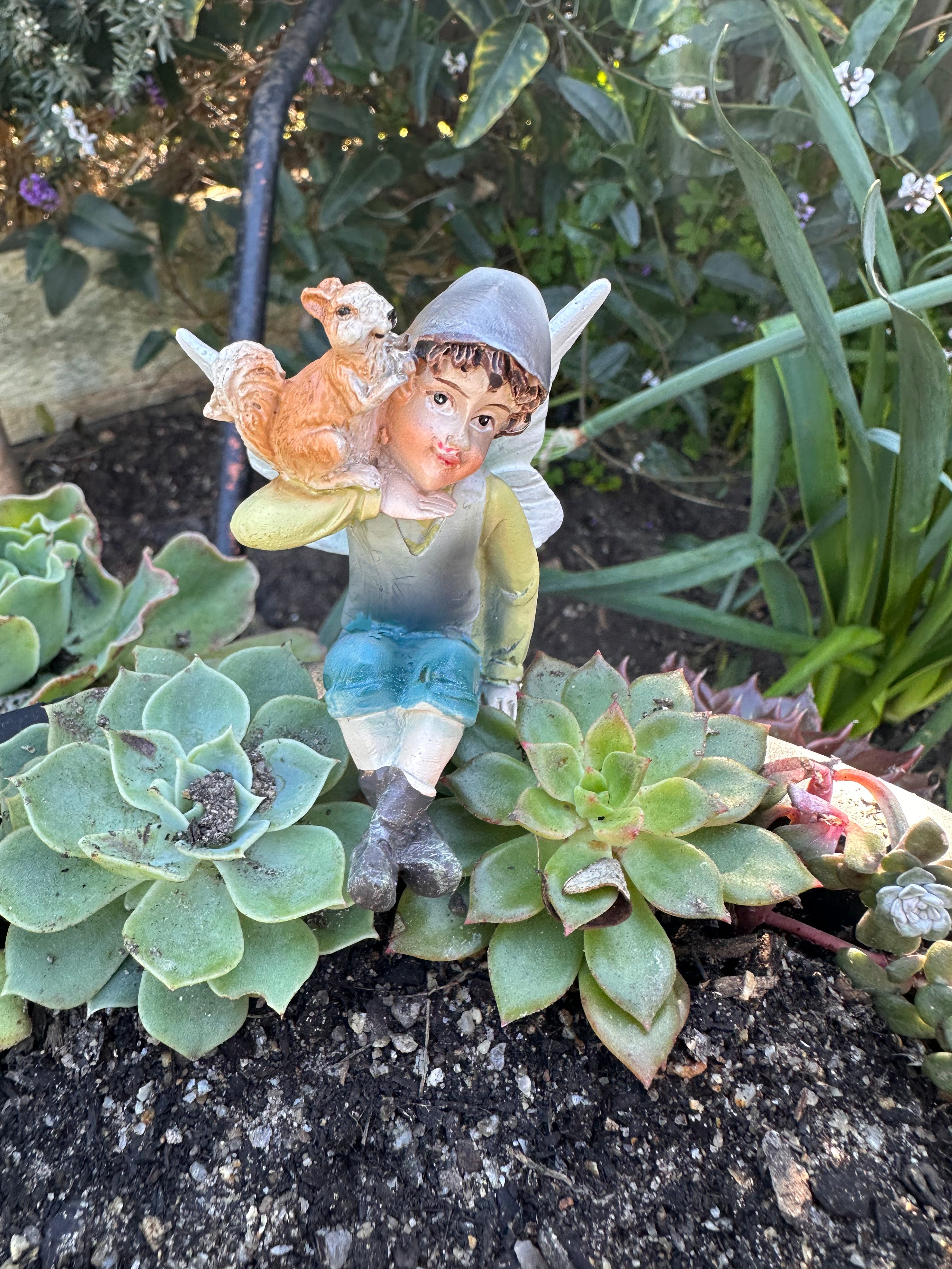 Sitting Elf Figurine with Squirrel