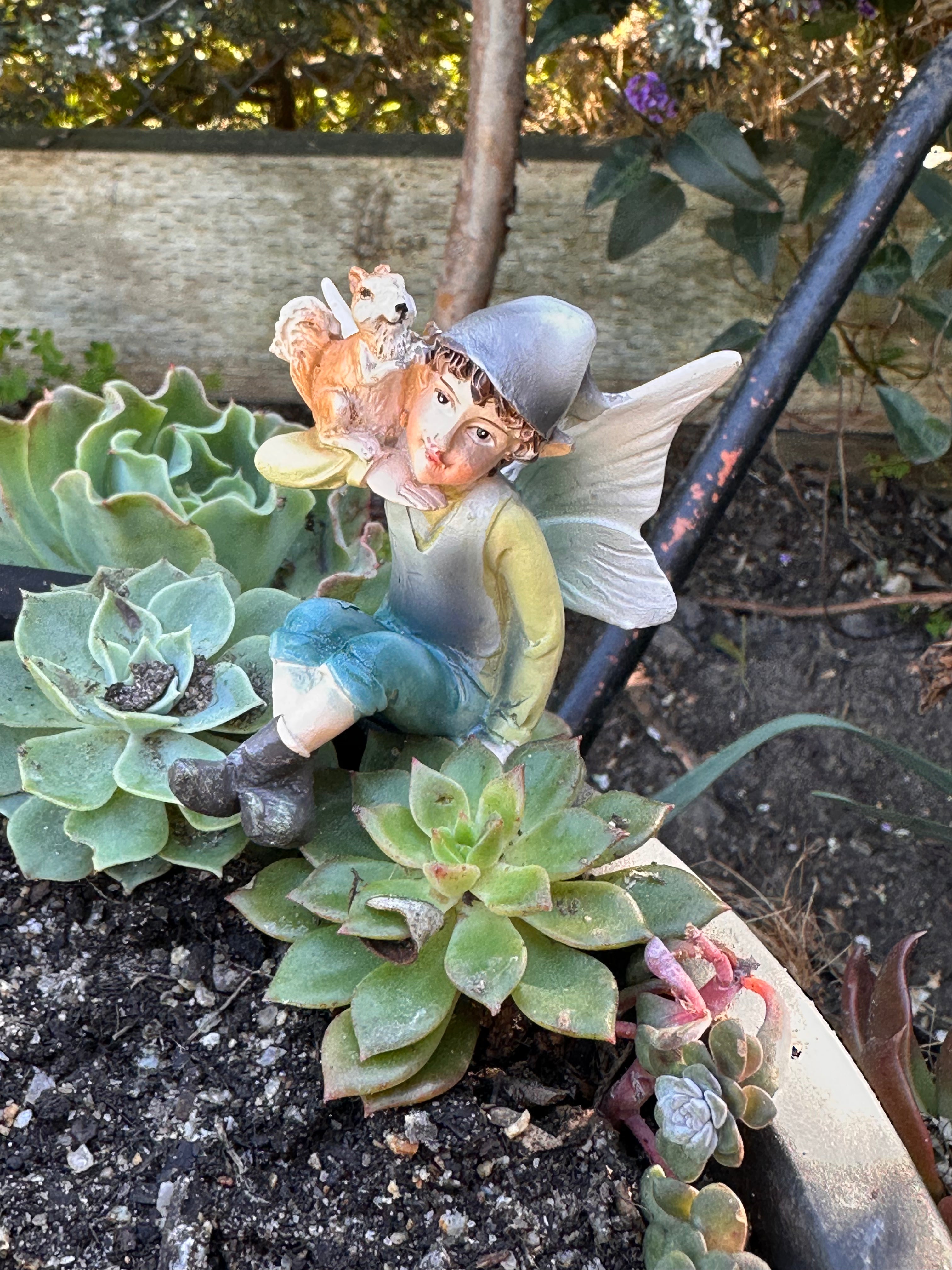 Sitting Elf Figurine with Squirrel