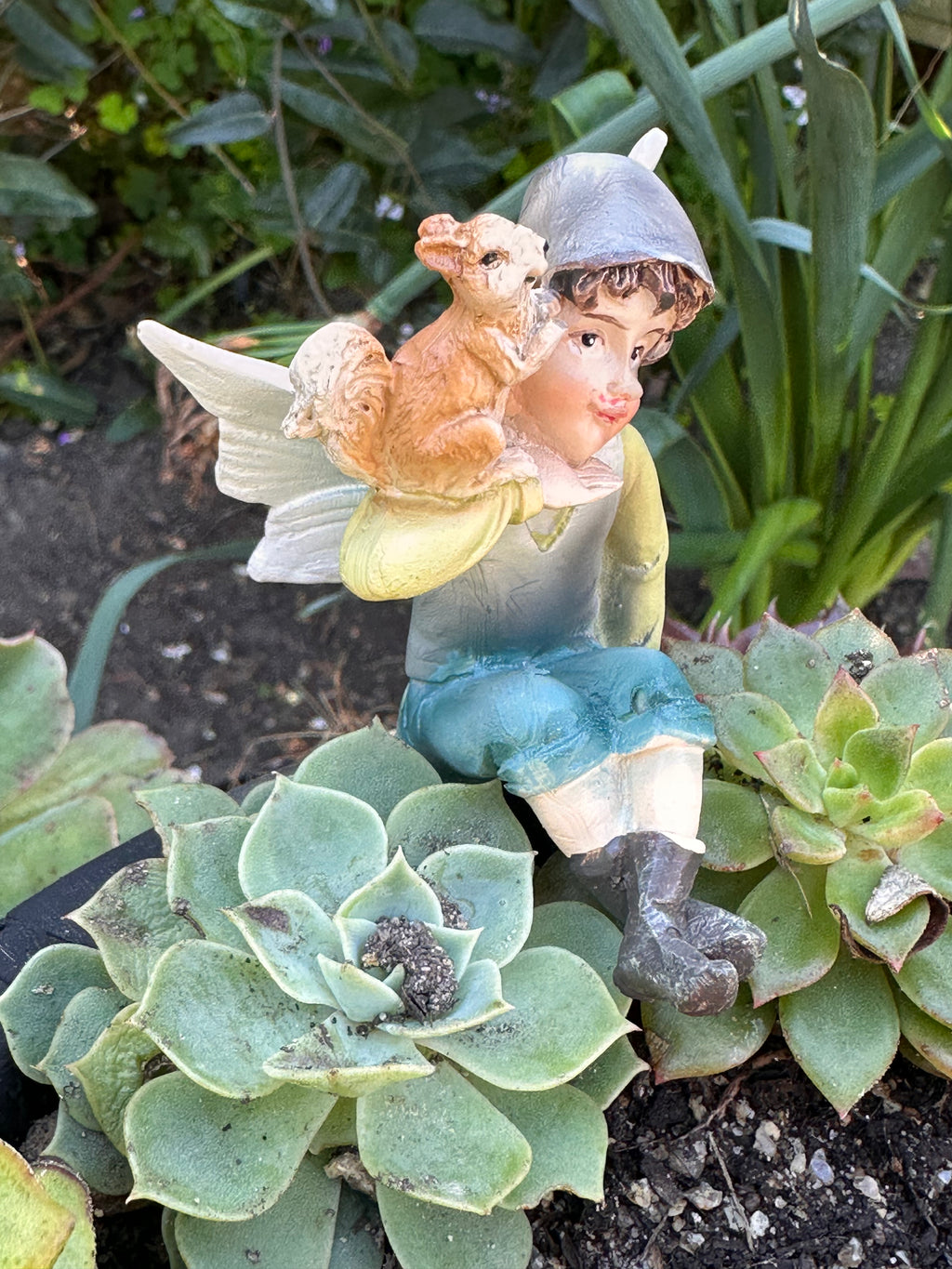 Sitting Elf Figurine with Squirrel