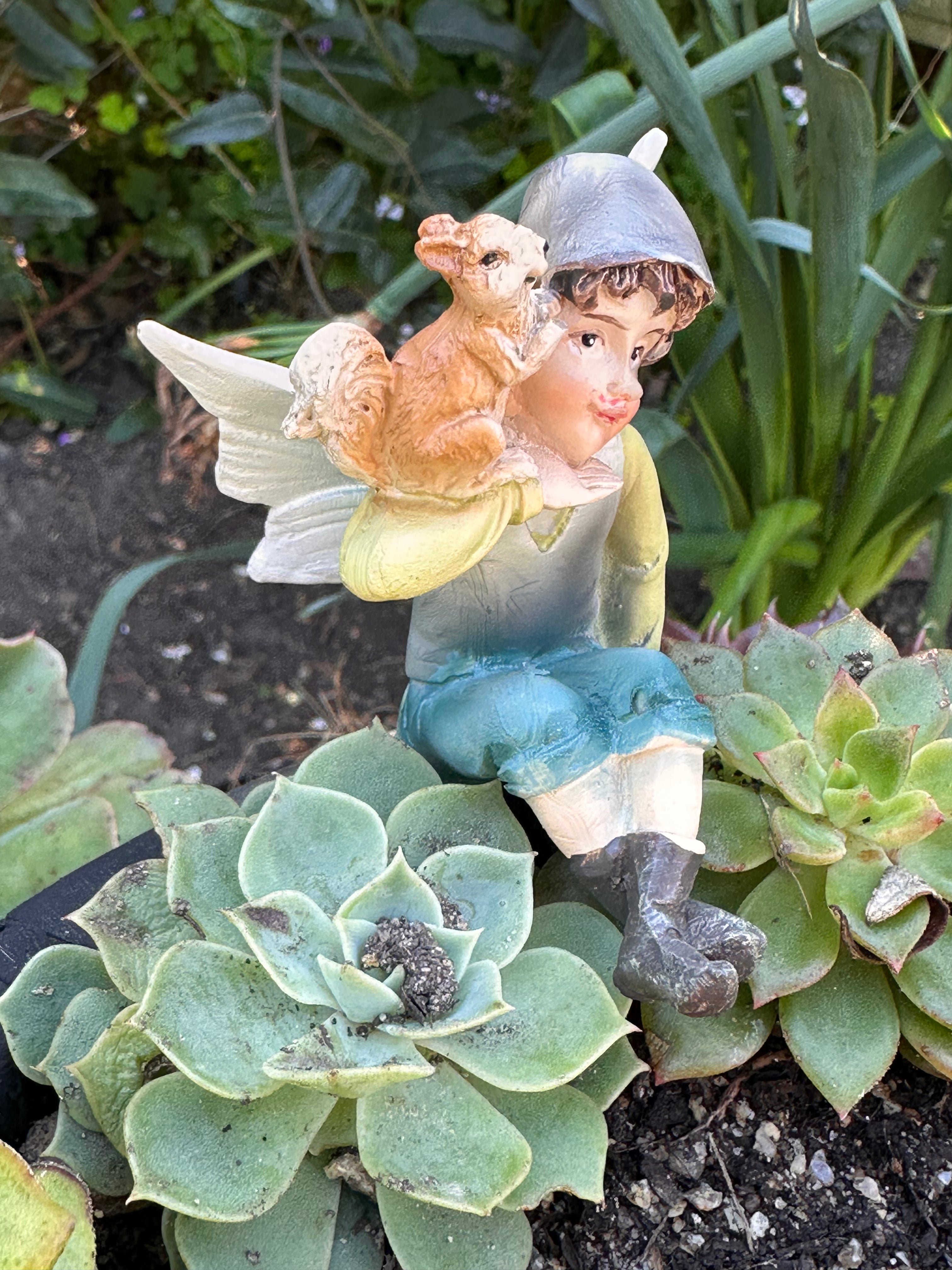 Sitting Elf Figurine with Squirrel