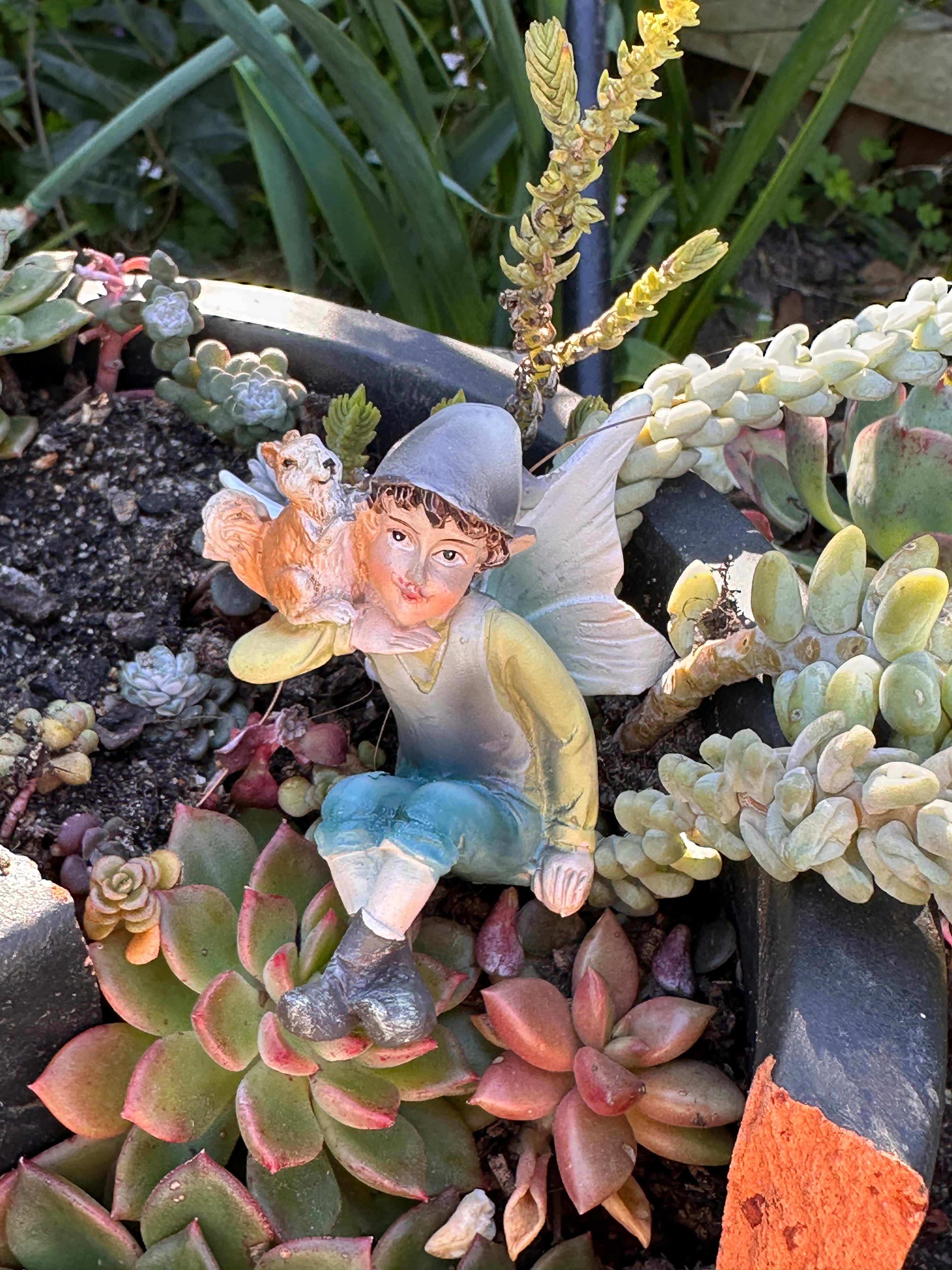 Sitting Elf Figurine with Squirrel