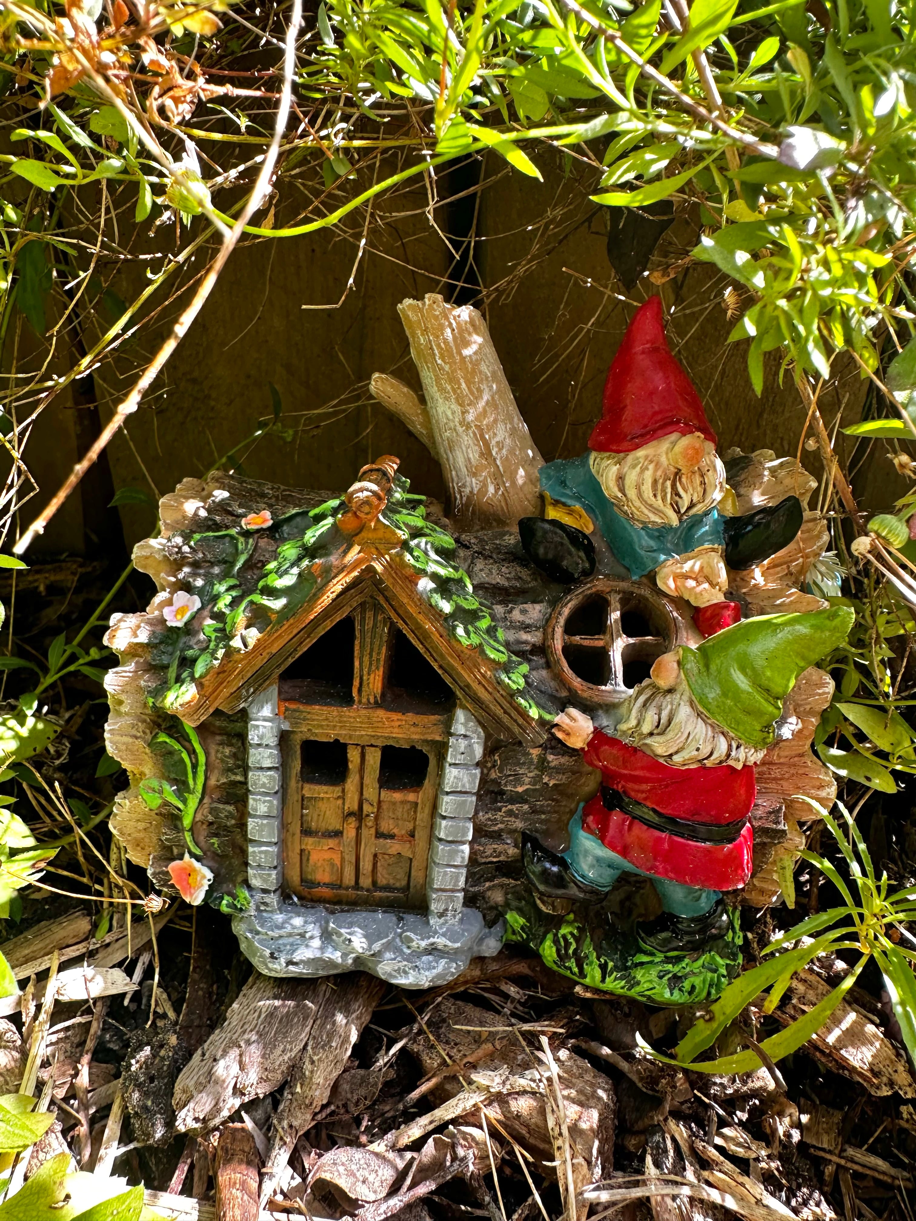 Solar gnome log cabin house