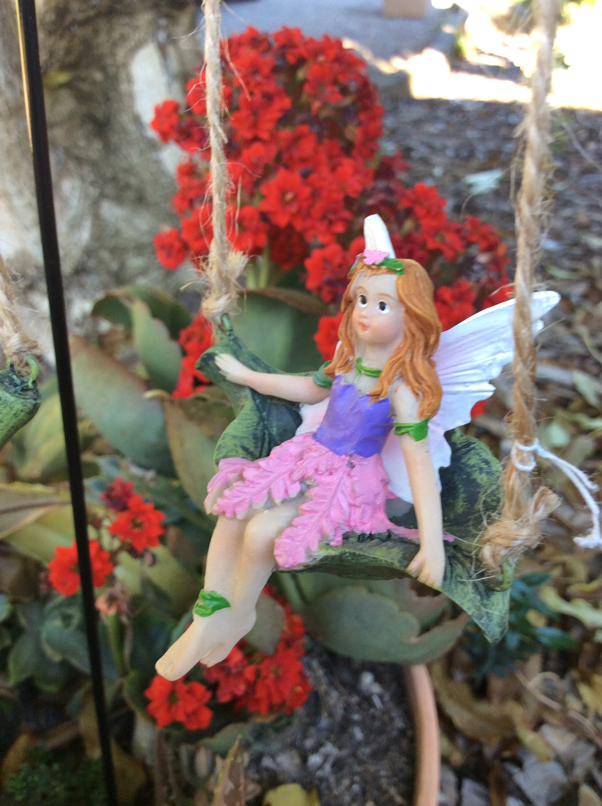 Set of 4 fairies sitting on a leaf swing with metal stake image 3