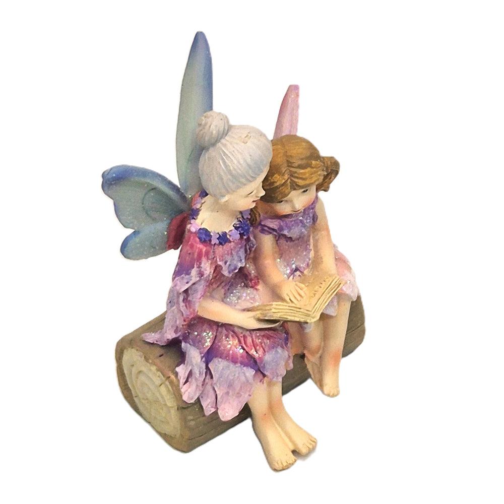 Fairy Grandmother reading with Fairy Granddaughter