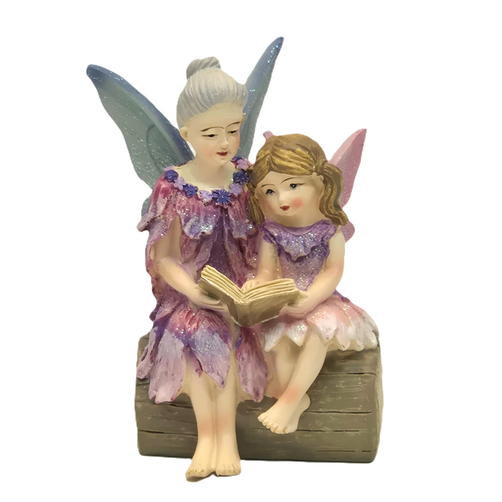 Fairy Grandmother reading with Fairy Granddaughter